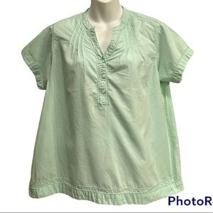 Woolrich top in mint green size large short sleeve. V neck